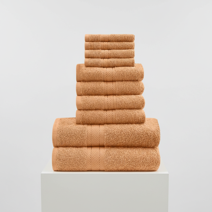 Group of 10 cotton towels, a complete set for bathroom luxury and comfort, absorbent and soft home textiles.