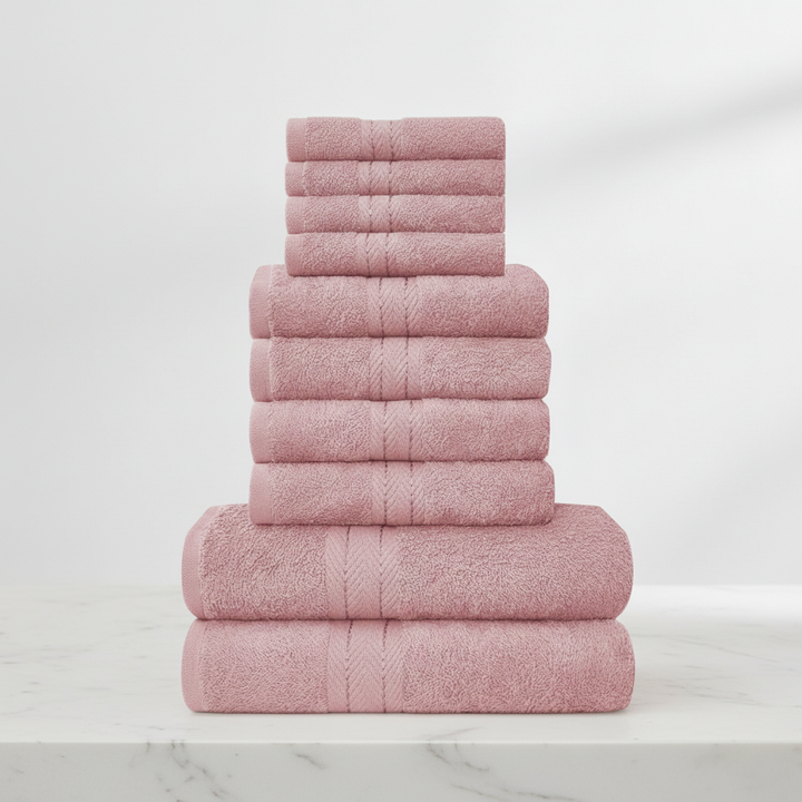 Soft white cotton hand towel with subtle woven detailing, perfect for a luxurious bathroom decor.