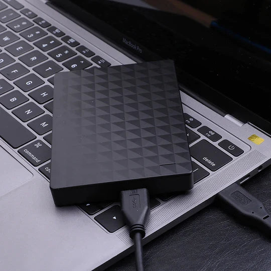 10TB External USB 3.0 Hard Drive connected to a laptop, providing instant, fast & secure mobile data storage.