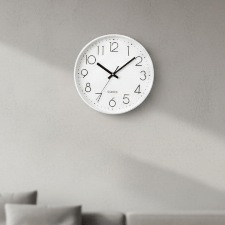 12-inch quiet quartz wall clock for modern home decor. Non-ticking, perfect for living room or bedroom.