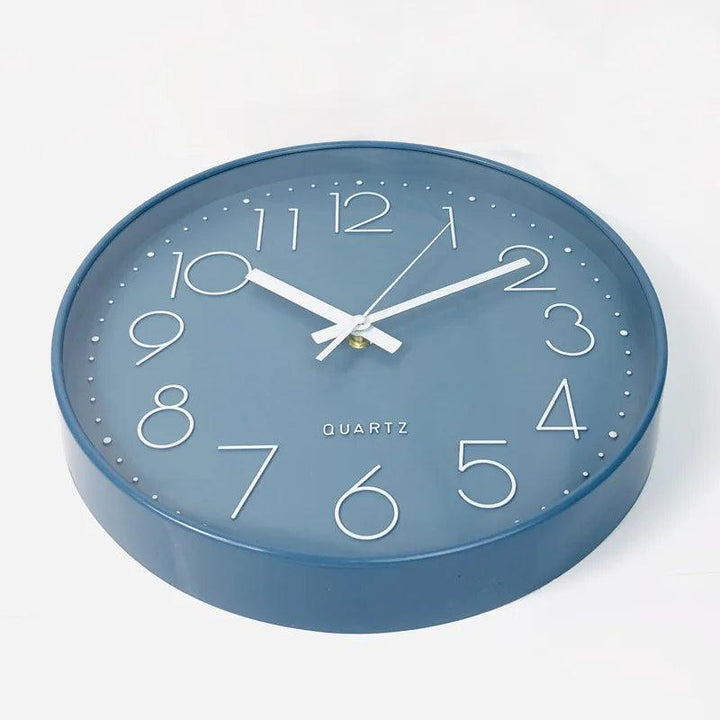 Bedroom friendly 12-inch silent wall clock. Non-ticking quartz movement for peaceful sleep & modern decor.