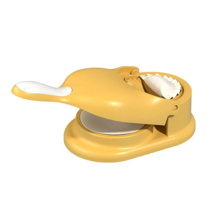 Manual dumpling maker & press for quick homemade dumplings, ravioli, and empanadas. Essential kitchen tool.