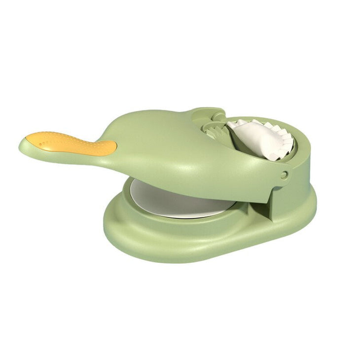 Handheld 2-in-1 dumpling press & sealer. Make uniform homemade dumplings and pastries quickly. Food prep tool.