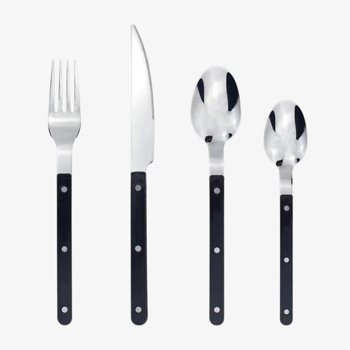 24-piece engraved stainless steel cutlery set for elegant dining.
