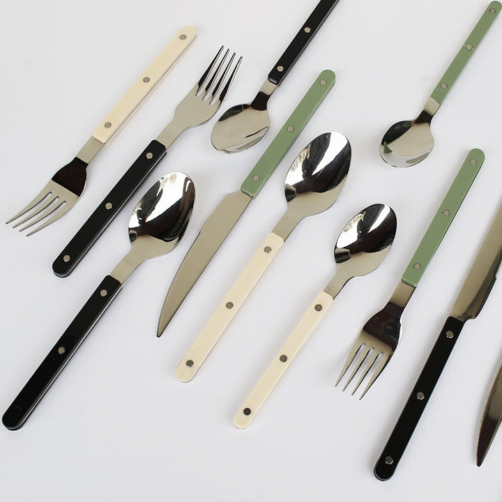 Elegant engraved stainless steel flatware, a 24-piece dining set for home.