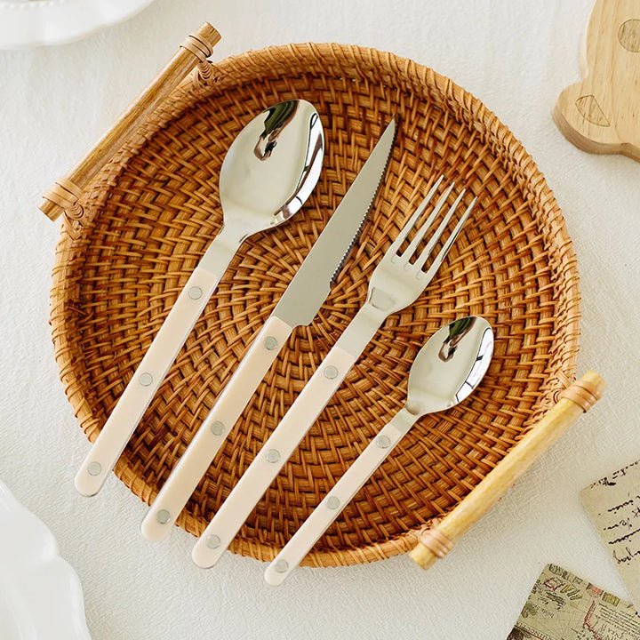 Complete 24-piece engraved stainless steel dinnerware set for stylish kitchen dining.