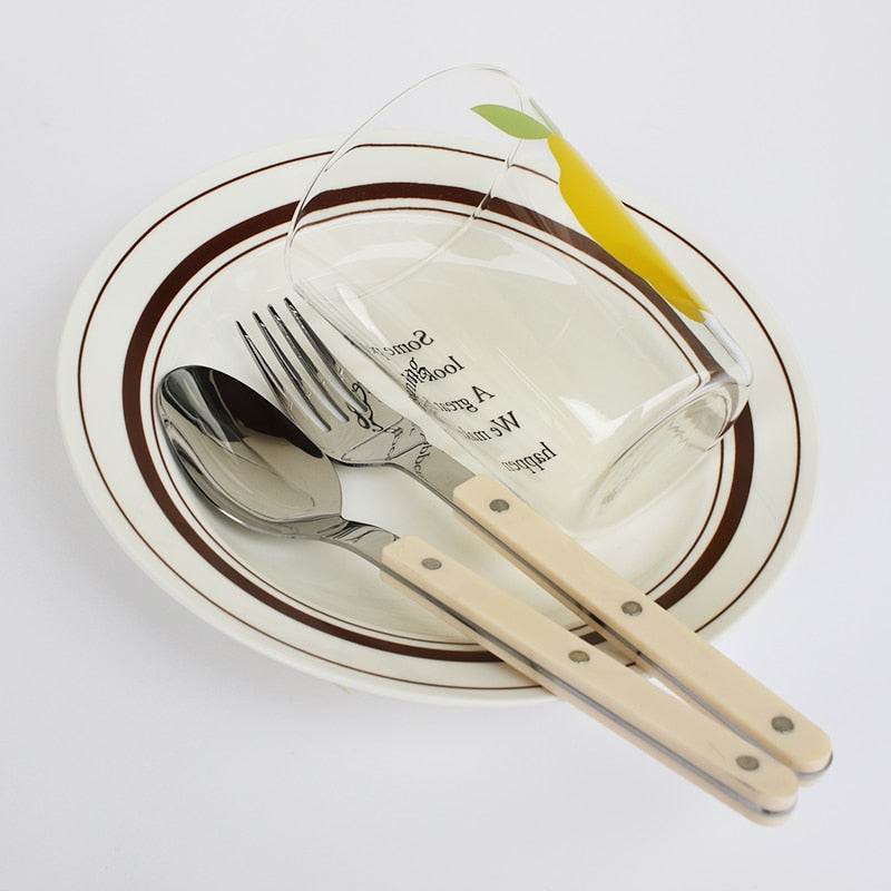 Beautiful 24-piece engraved stainless steel dining set, perfect elegant kitchen gift.