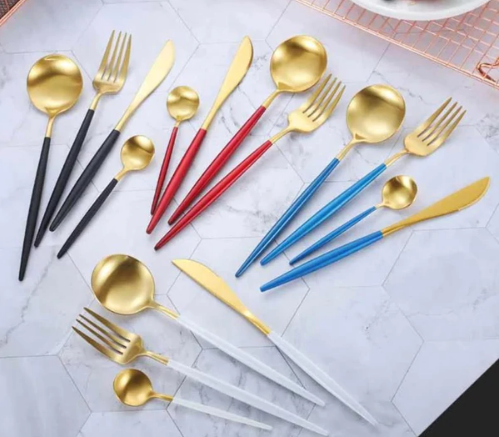 Complete 24-piece dinnerware set: forks, knives, spoons, stainless steel.