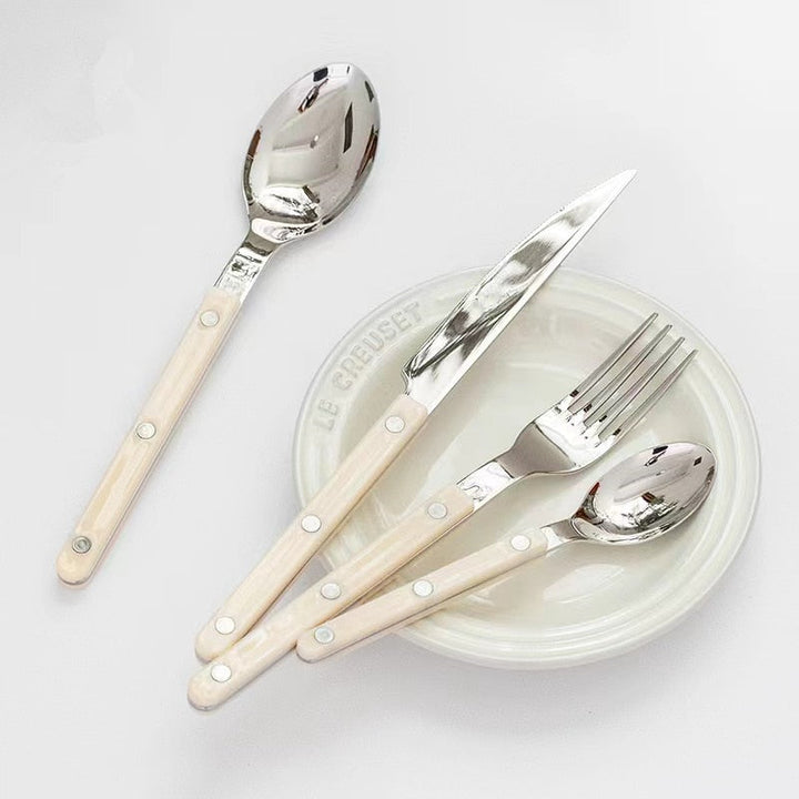 Luxurious 24-piece engraved stainless steel dining set, a perfect gift for new homes or special events.