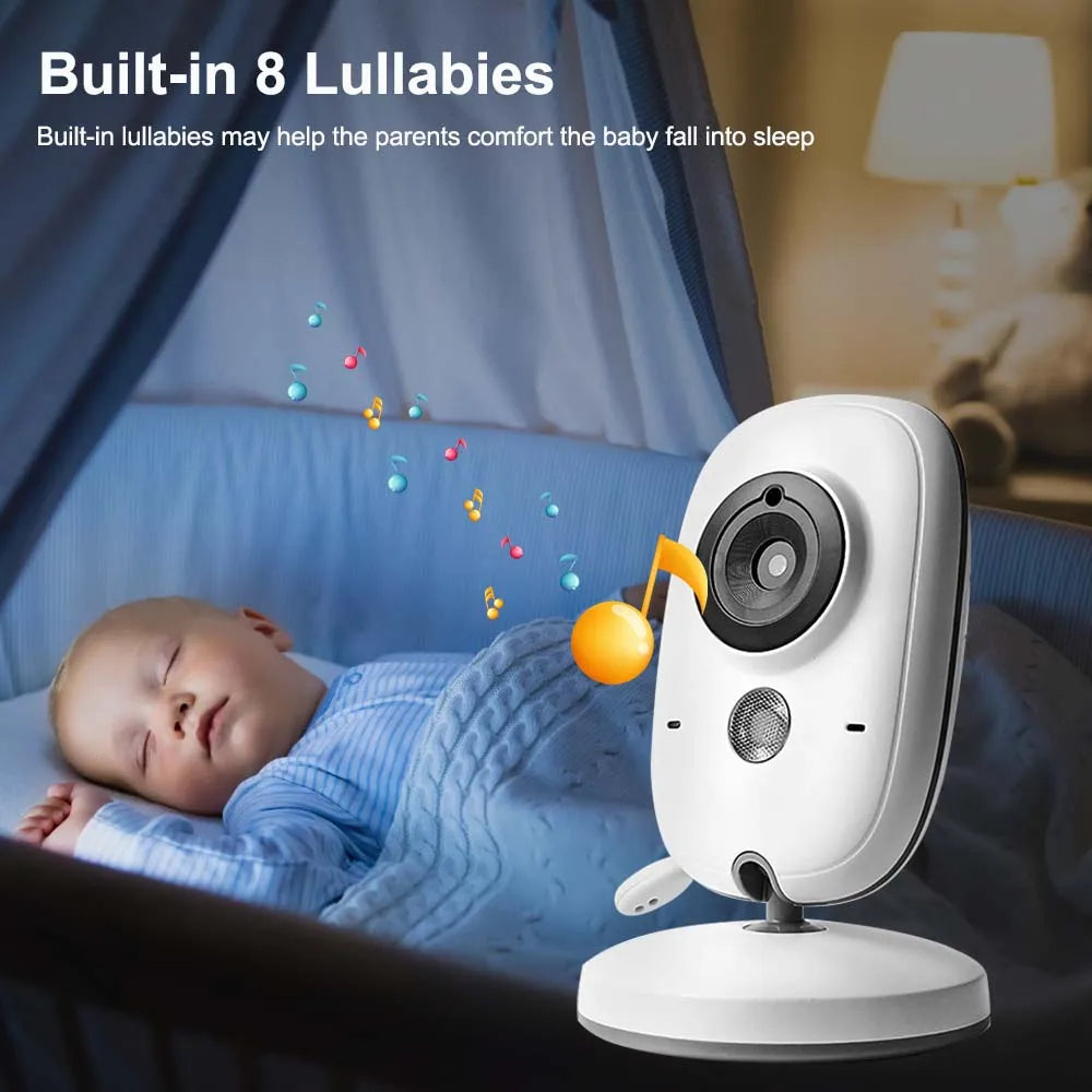 Parent interacting with baby via 3.5-inch video monitor's two-way audio and lullabies.