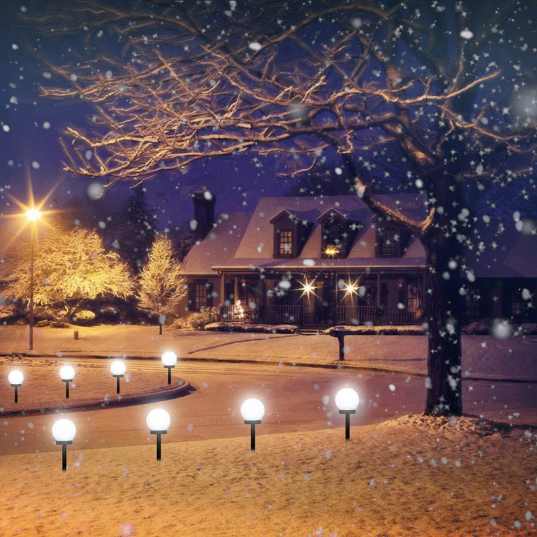 Set of 3 waterproof solar LED garden lights. Bright, energy-efficient orbs for outdoor patio & path decor.
