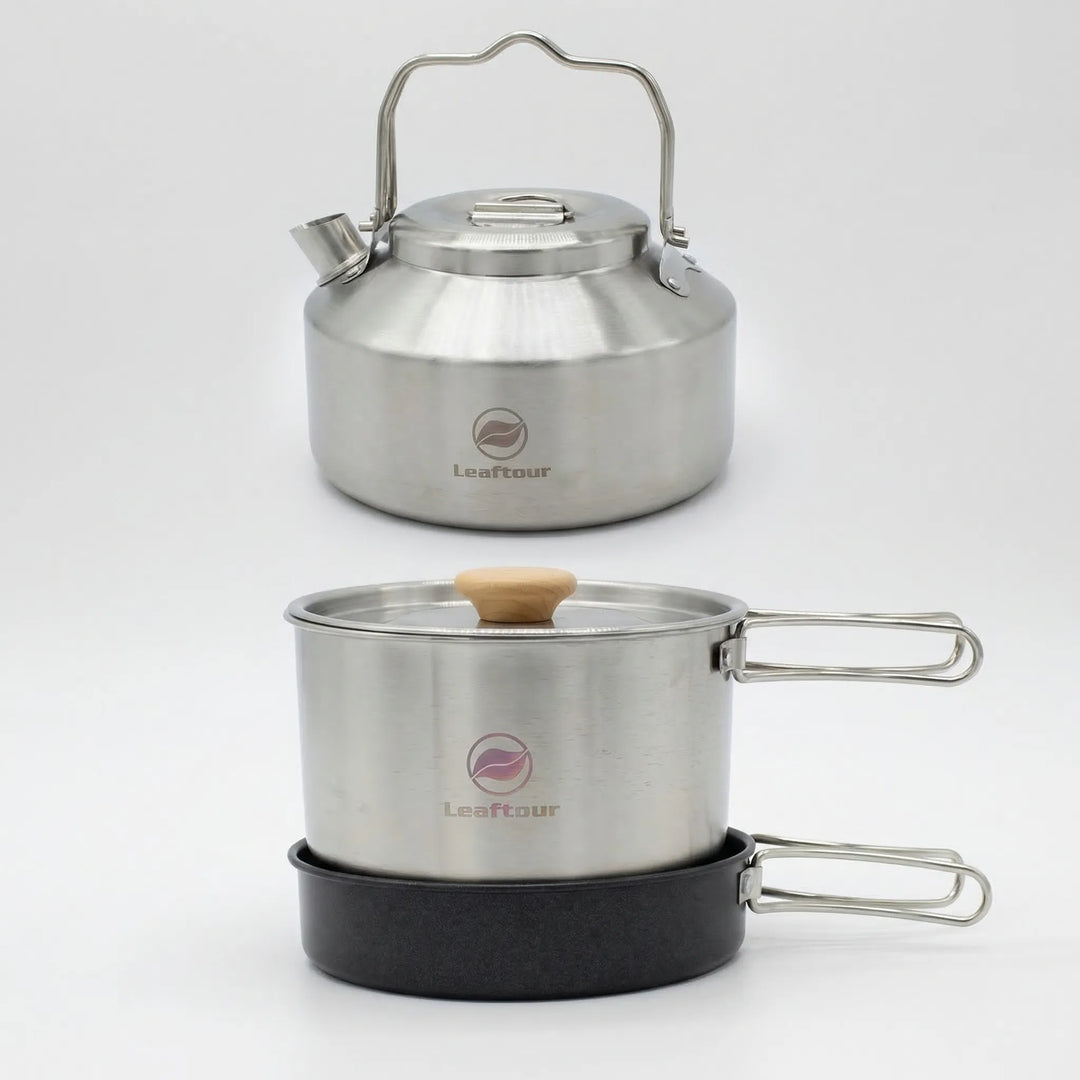 Portable backpacking kitchen: 3-piece nonstick camping cookware set including pot, pan, & lid for easy meals.