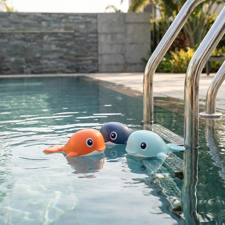 3-piece set of colorful kids' wind-up floating whale bath toys for fun bathtime play & water adventures.