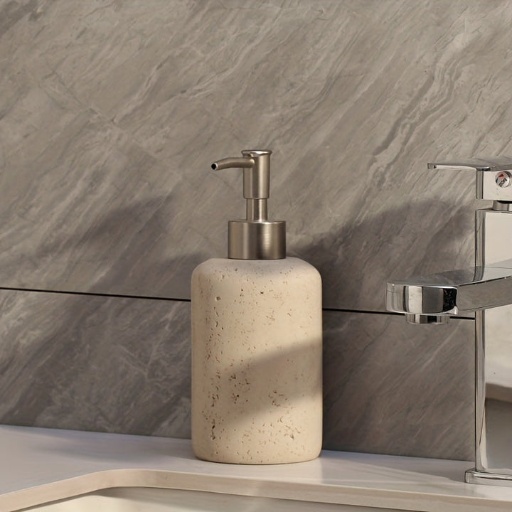 Close-up of 300ml marble resin soap dispenser with sleek stainless steel pump detail