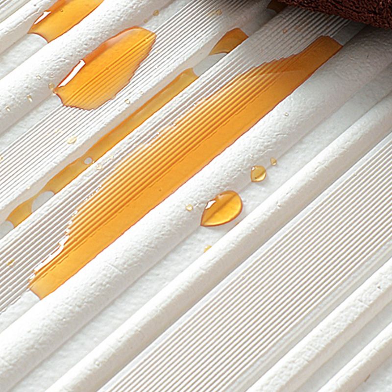 Elegant 3D vinyl wall panels, self-adhesive, offering a durable and decorative wall finish.