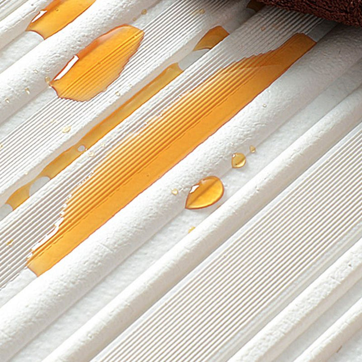 Elegant 3D vinyl wall panels, self-adhesive, offering a durable and decorative wall finish.