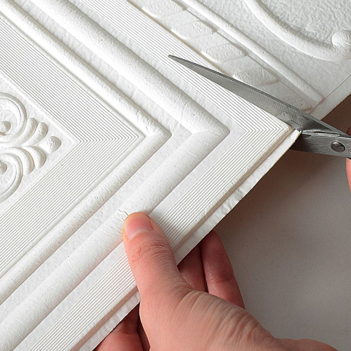 White 3D vinyl wall panels, self-adhesive, providing a contemporary textured wall decor solution.