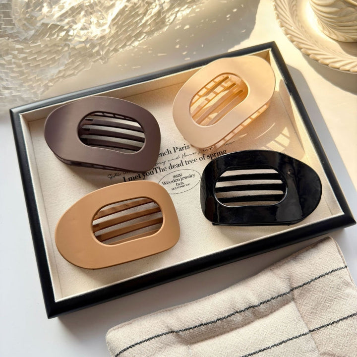 Durable, minimalist strong hold claw clips for women's hair. Essential hair accessory for daily styling.