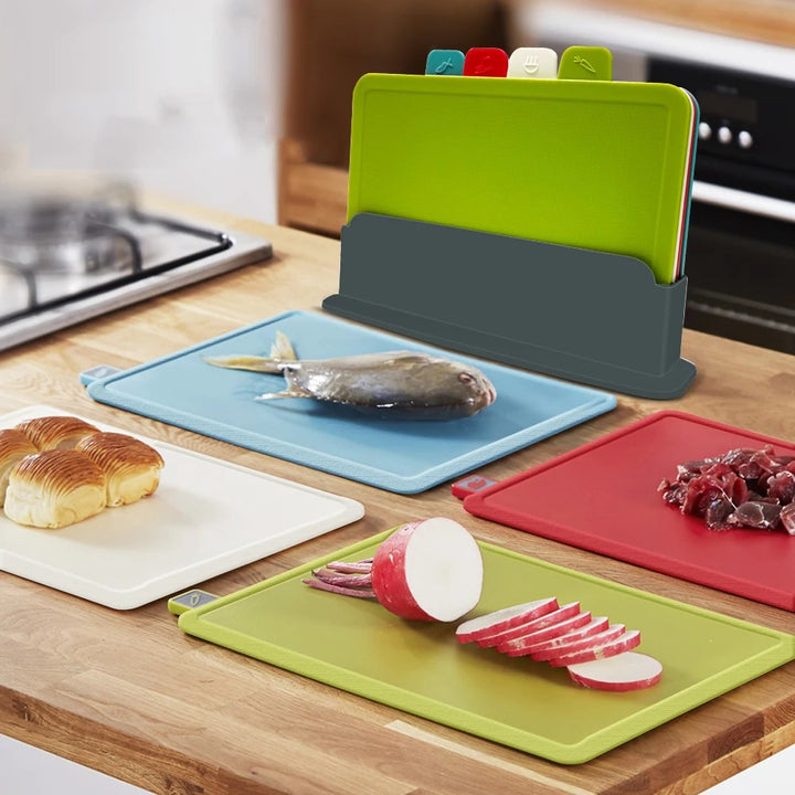 Eco-friendly 4-piece wheat straw cutting board set with storage holder, ideal for sustainable kitchen prep.
