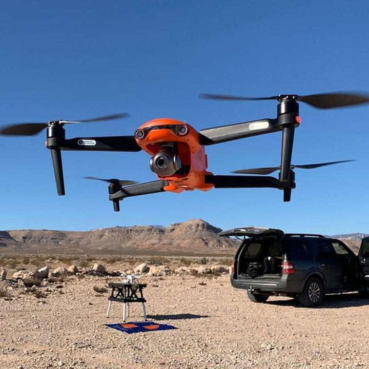 High-flying 4K camera drone capturing stunning aerial photography with extended flight.