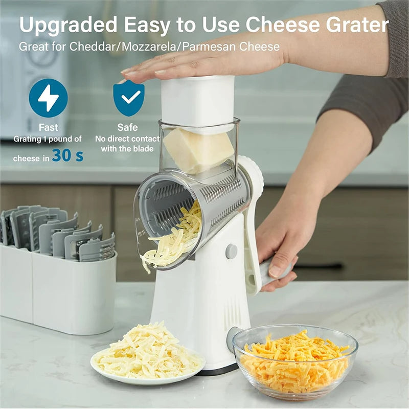 Manual rotary grater for cheese & veggies. Includes multiple blades for slicing, shredding, and effortless meal prep.