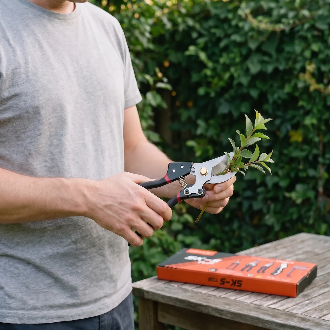 5-piece garden hand tool set with pruner, trowel, cultivator, weeder & gloves for efficient plant care & yard work.