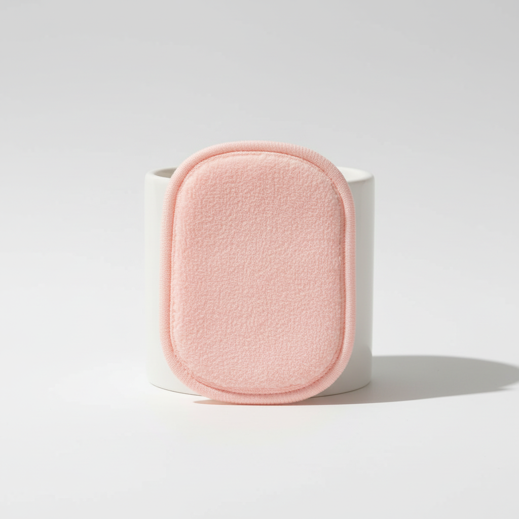 Soft texture of a reusable facial cleansing pad, showcasing its gentle microfiber material