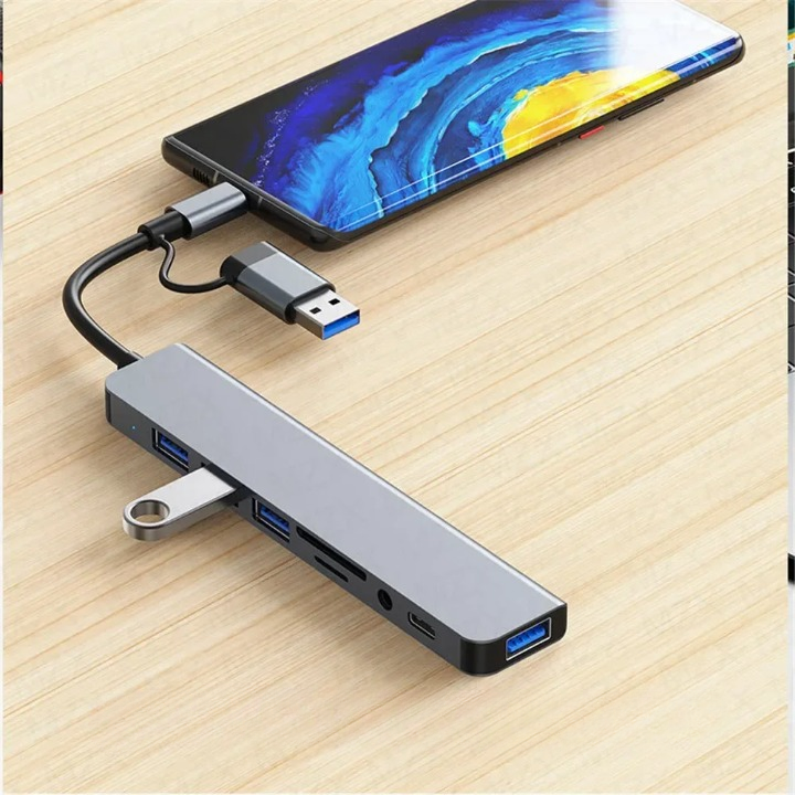 8-in-1 USB-C Hub in silver, offering universal connectivity for laptops and devices.