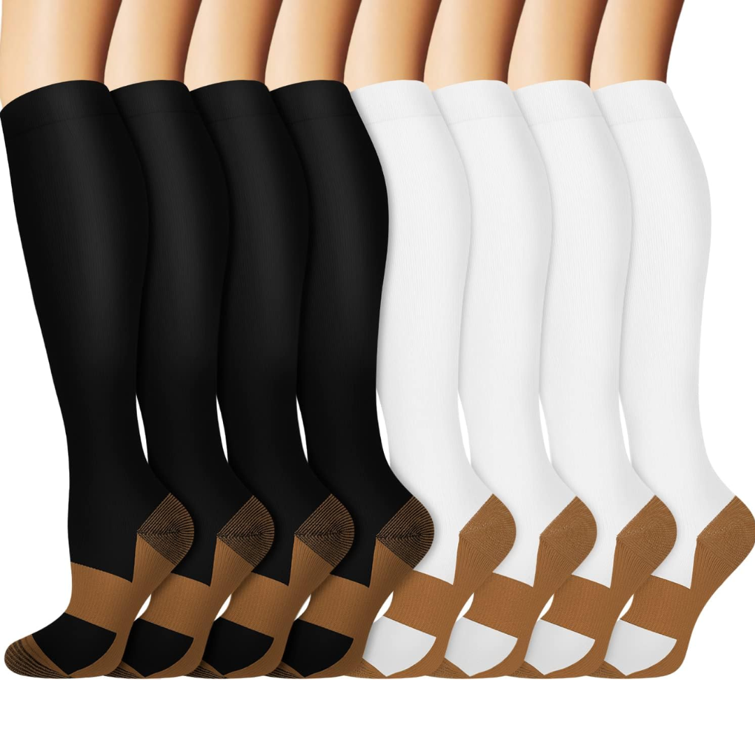 A person wearing black copper compression socks, showing their comfortable and supportive fit