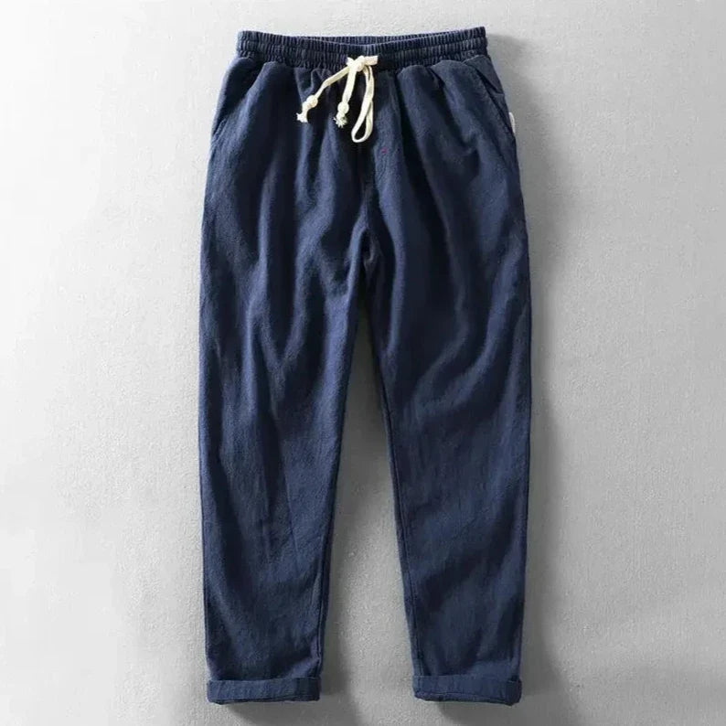 A man wearing relaxed fit Zen trousers, showcasing their comfort and casual style for men.