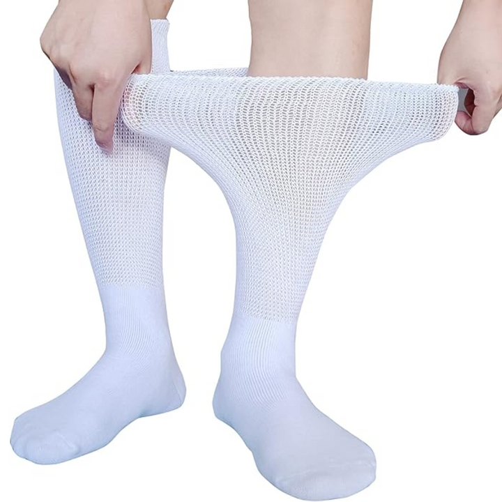 Soft, non-binding knee-high socks providing gentle circulation support for edema and diabetic foot care.