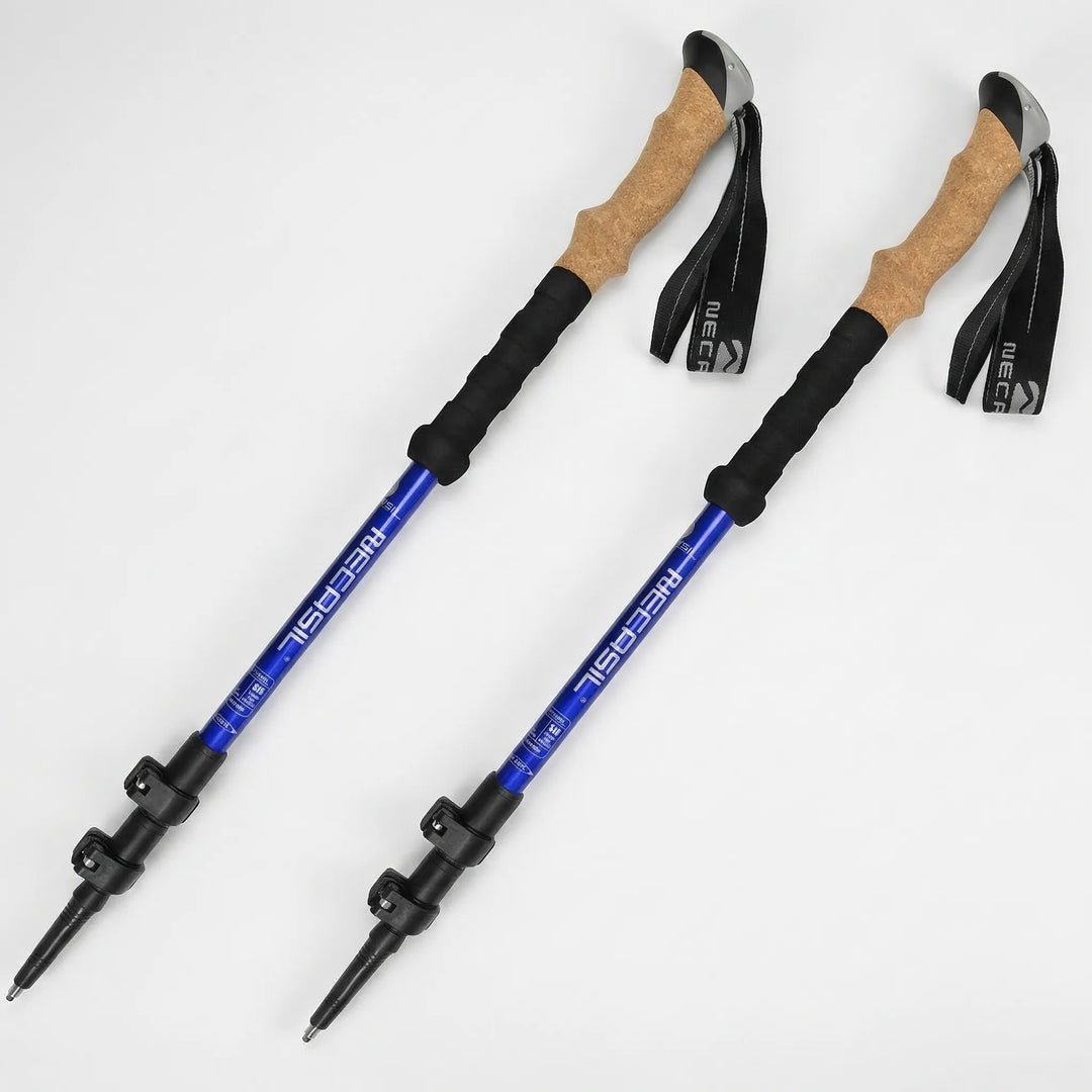 Adjustable trekking poles featuring comfortable grips & sturdy tips, enhancing stability on rugged trails.