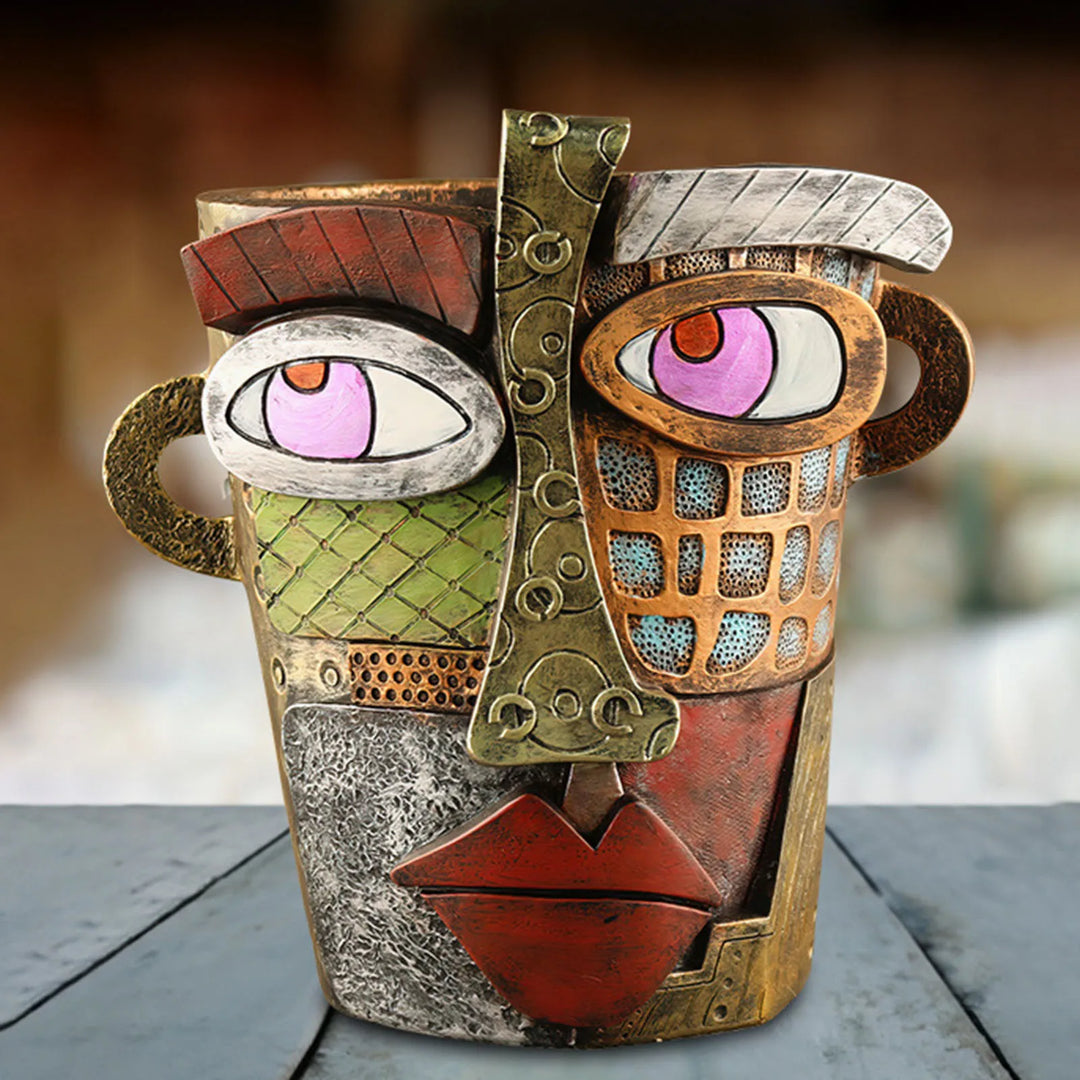 Modern abstract art face planter, a unique decorative plant pot for any space.