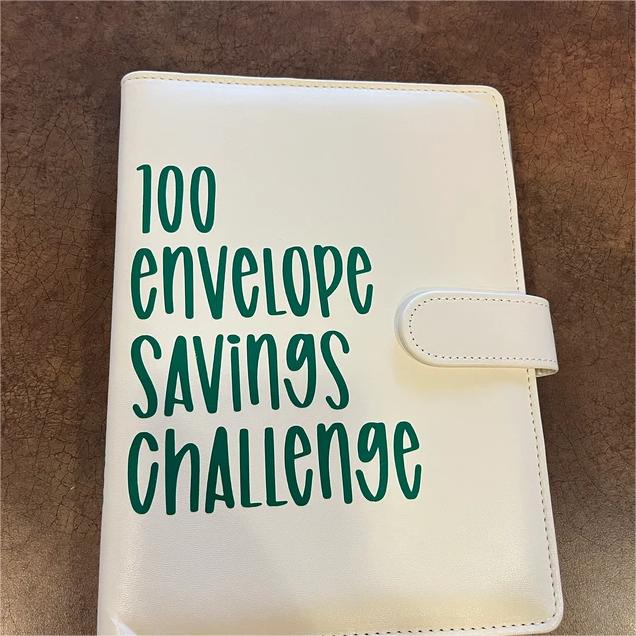 Organized AchieveTrack 100-day challenge progress folder, a productivity tool & success journal.