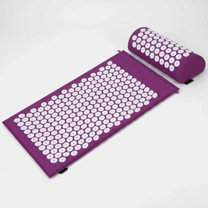 Close-up of acupressure mat with spikes, targeting back and neck pressure points for muscle pain and stress relief.