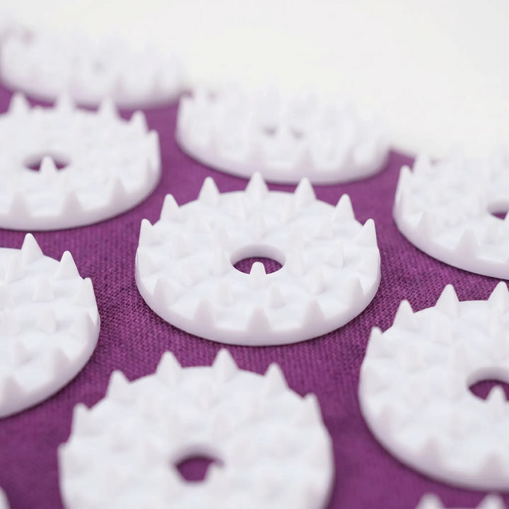 Relaxing acupressure mat and pillow set for full back and neck pain relief, reducing muscle tension and stress.