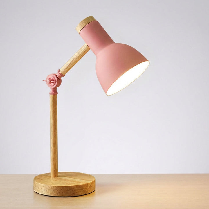 Modern Nordic adjustable task lamp from Arclume, angled for precise lighting on a clean desk surface
