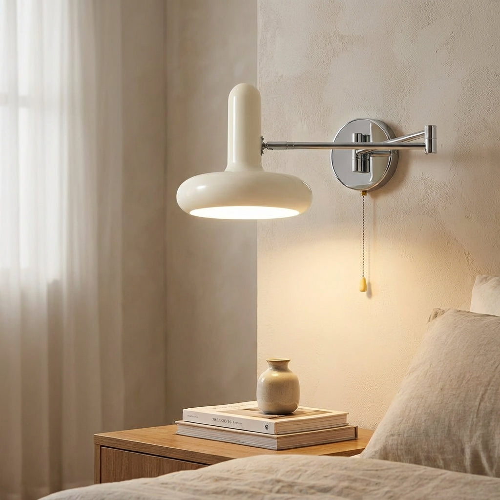 Adjustable black iron wall sconce, Bauhaus-inspired design, ideal for modern indoor lighting & home decor