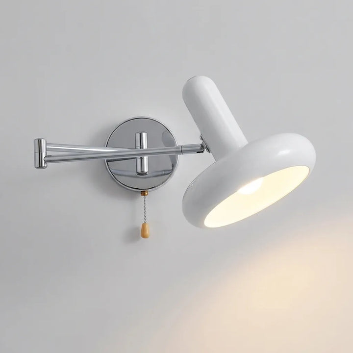 Swinglyte adjustable wall sconce in black iron, perfect contemporary reading light with Bauhaus style