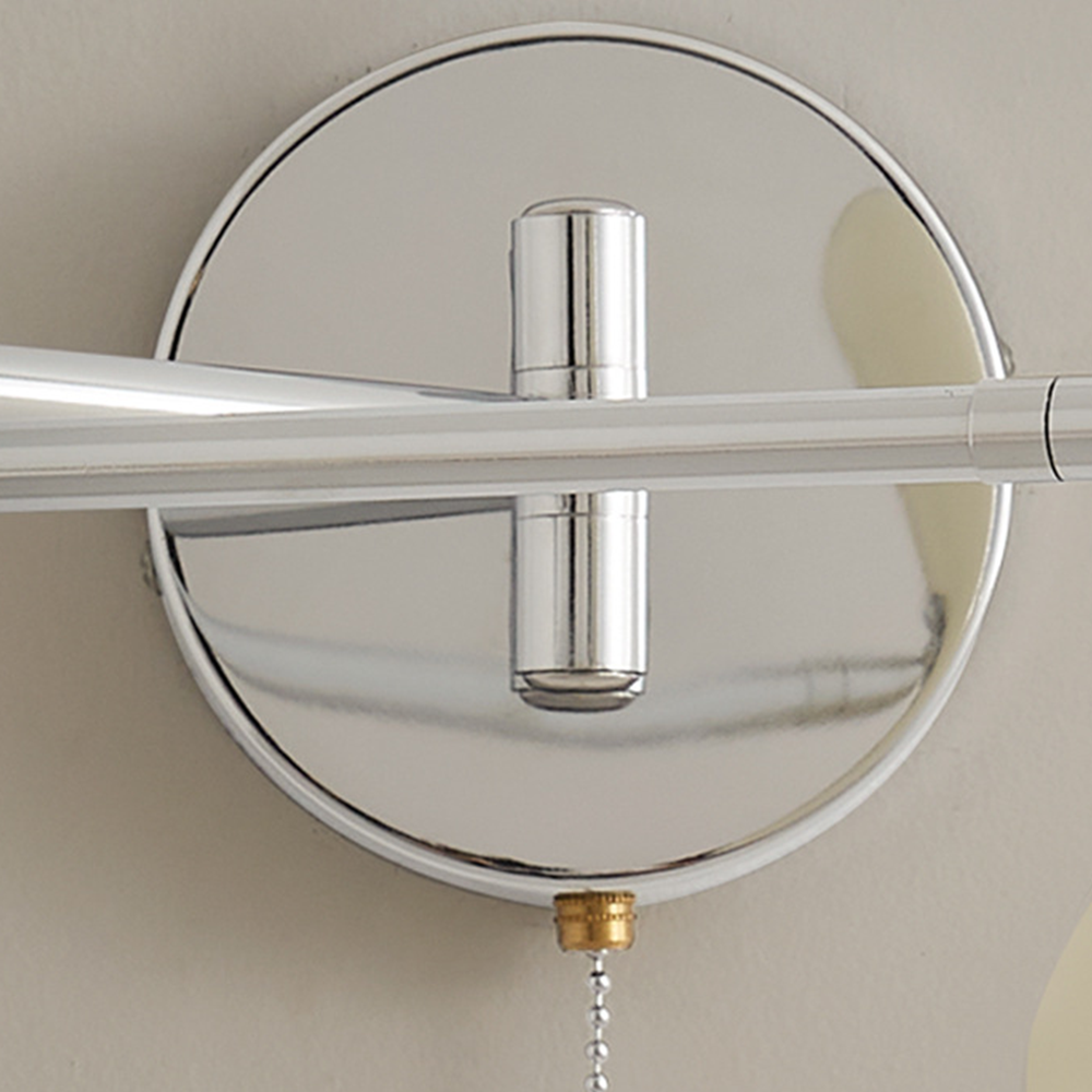 Industrial-chic adjustable wall sconce, black finish, Bauhaus design, perfect for focused indoor lighting
