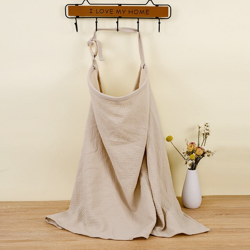 Soft breathable cotton breastfeeding apron, perfect for newborn care and privacy on-the-go.