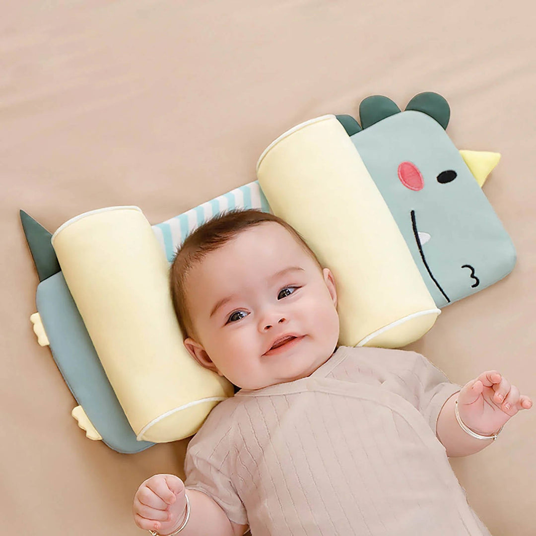Adjustable newborn baby head pillow for flat head prevention, providing gentle infant head support.