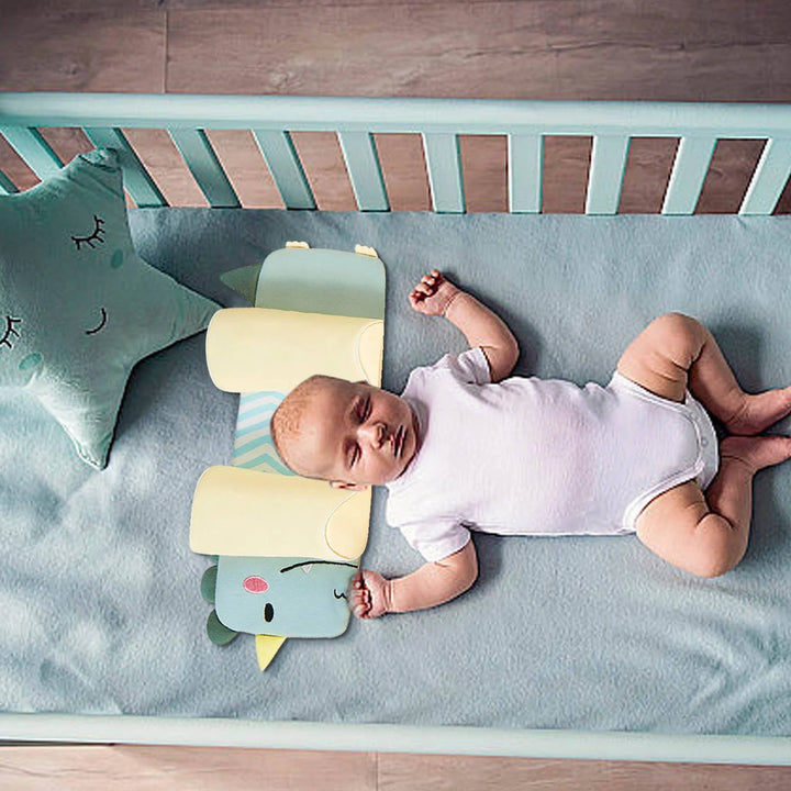 Ergonomic newborn pillow with buckwheat husk filling, offering optimal head support & flat head prevention.