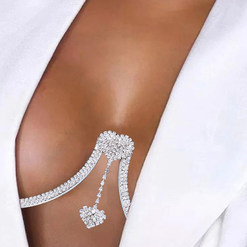 Luxurious adjustable rhinestone chest pendant body chain, statement women's jewelry accessory.