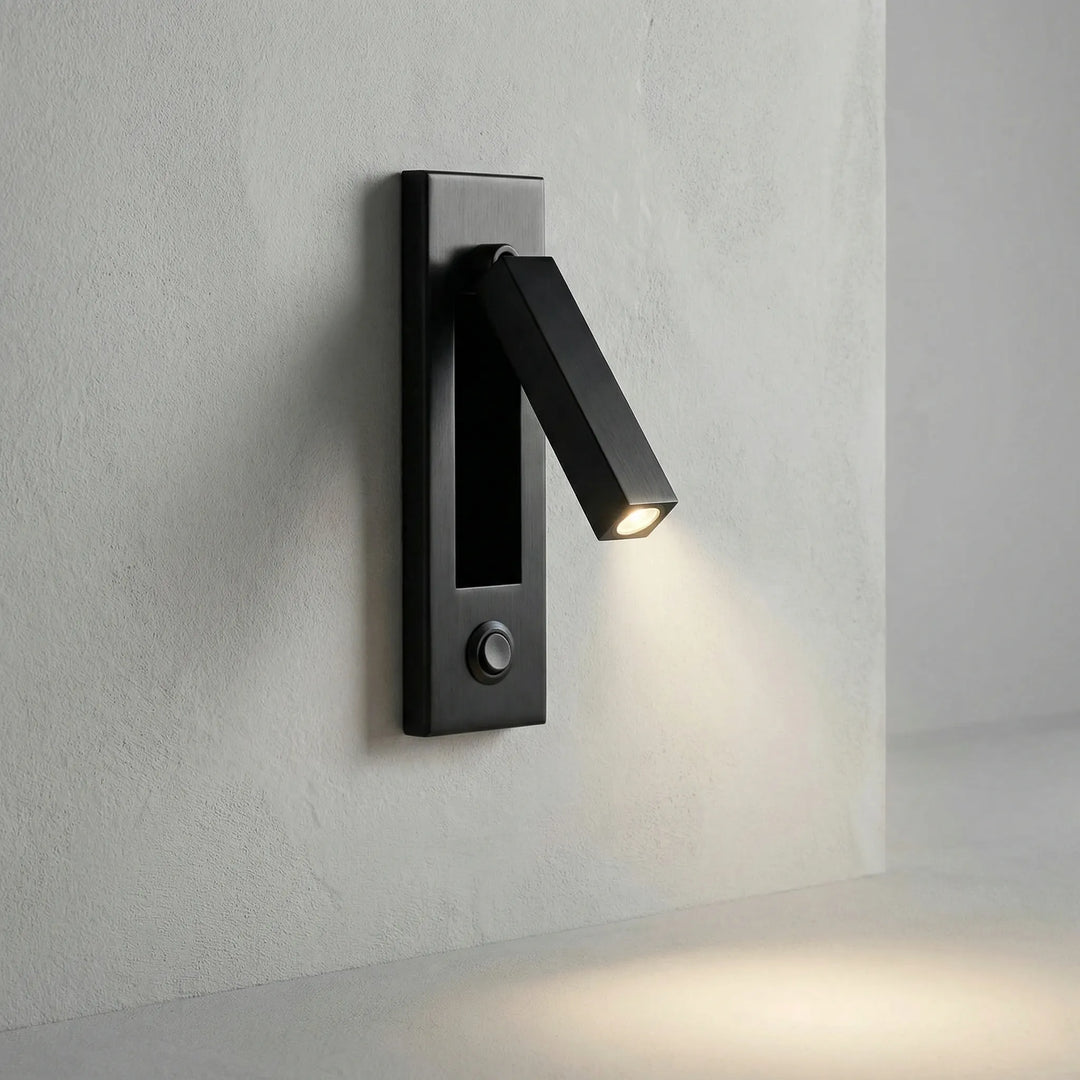 Detailed view of the LED light source on the adjustable wall lamp