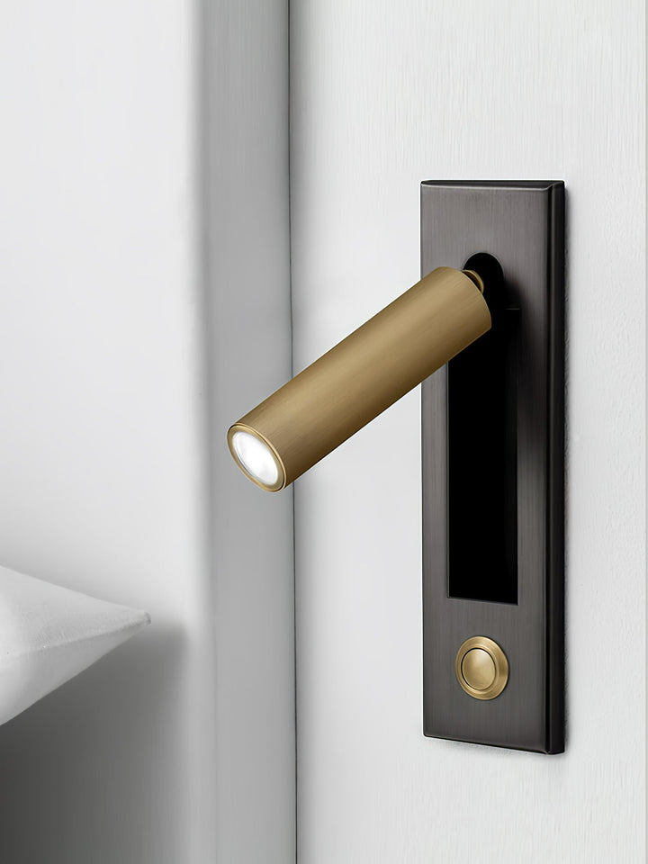 Sleek metal adjustable wall lamp, offering versatile task lighting