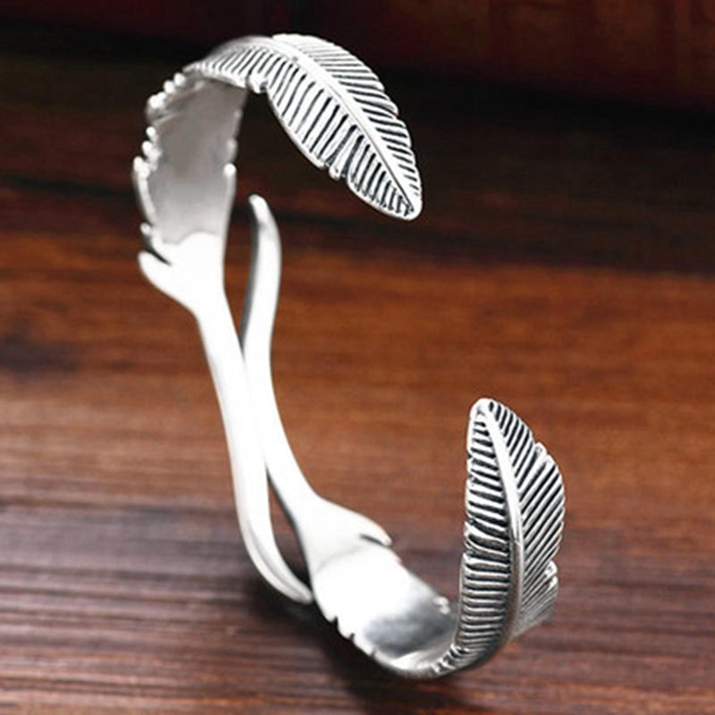 Bohemian style adjustable silver feather charm bracelet, a thoughtful gift for her.