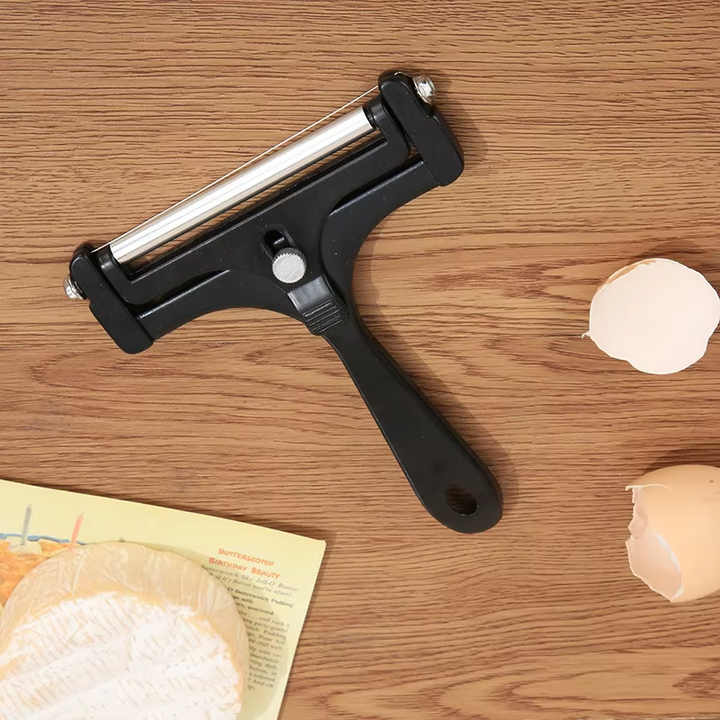 Easy-to-use adjustable stainless steel cheese slicer, great for uniform butter and cheese slices in any kitchen.