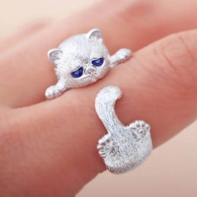 Adjustable sterling silver kitten ring for women, a cute and dainty animal jewelry piece, perfect as a gift for cat lovers.