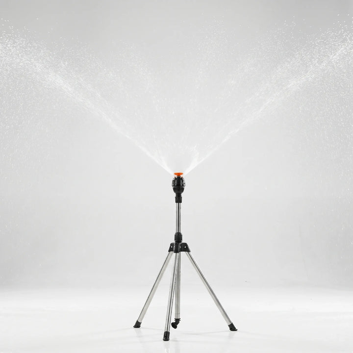 Outdoor lawn & garden watering with a sturdy adjustable tripod sprinkler. Efficient irrigation for healthy grass.